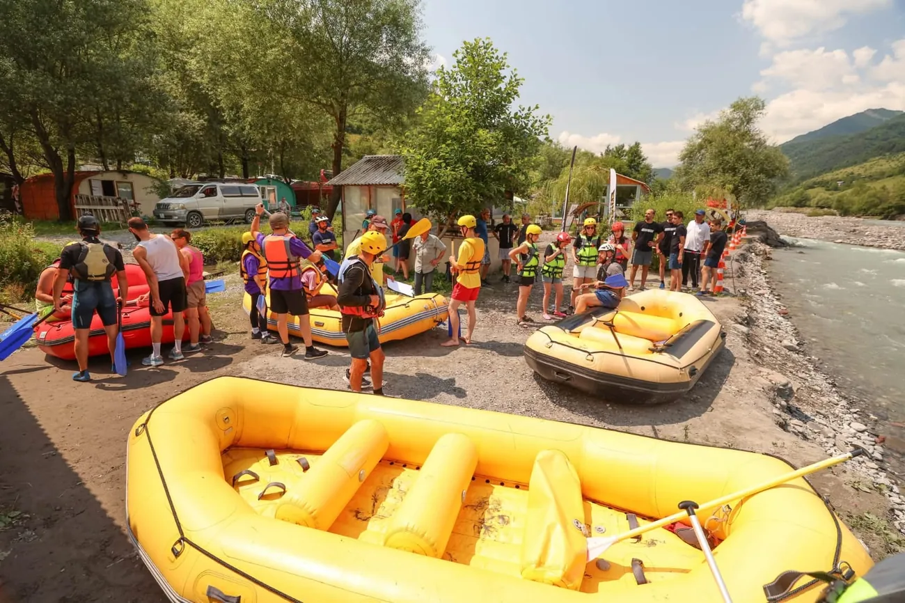 Rafts and guests gathered at the camp before launch